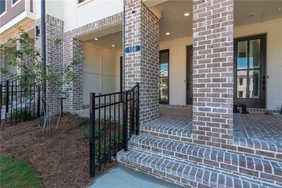 Exterior details and patio area of a home in IveyBrooke, Alpharetta (Image 18). Exterior details and patio area of a home in IveyBrooke, Alpharetta (Image 18).