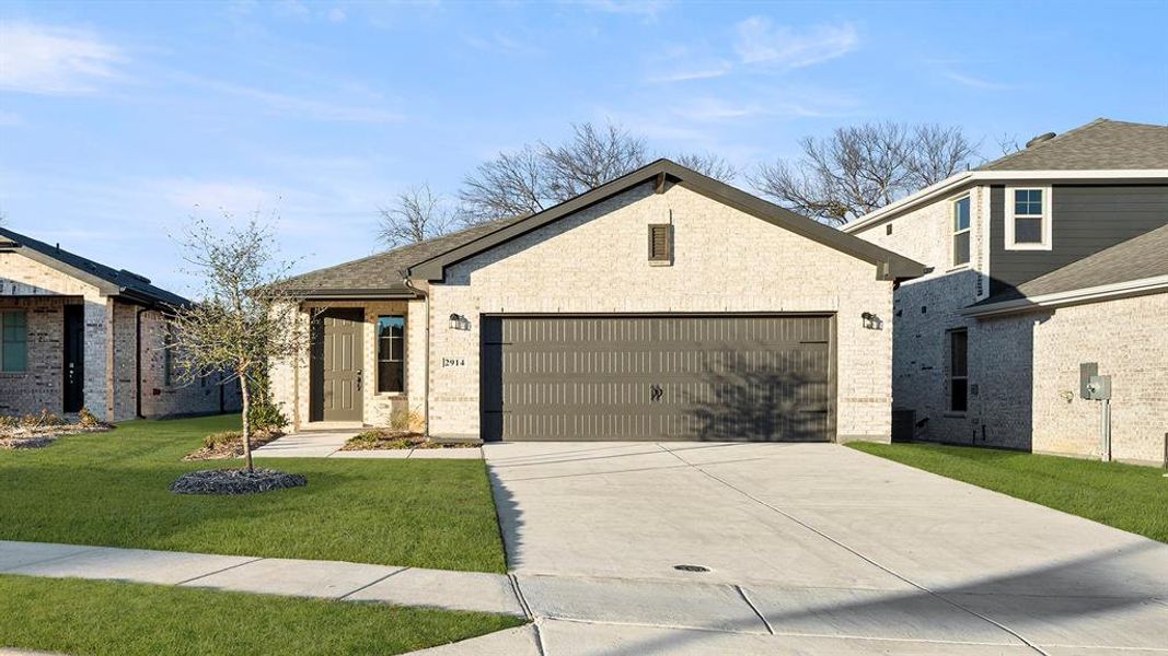 Front exterior of a new home in Churchill 40s, Anna, TX, highlighting curb appeal (Image 25).