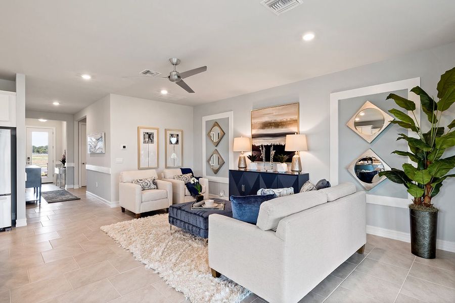 Representative furnished interior of a home built from the Delray by D.R. Horton in Coral Bay - Express & Tradition, North Fort Myers (Image 8).