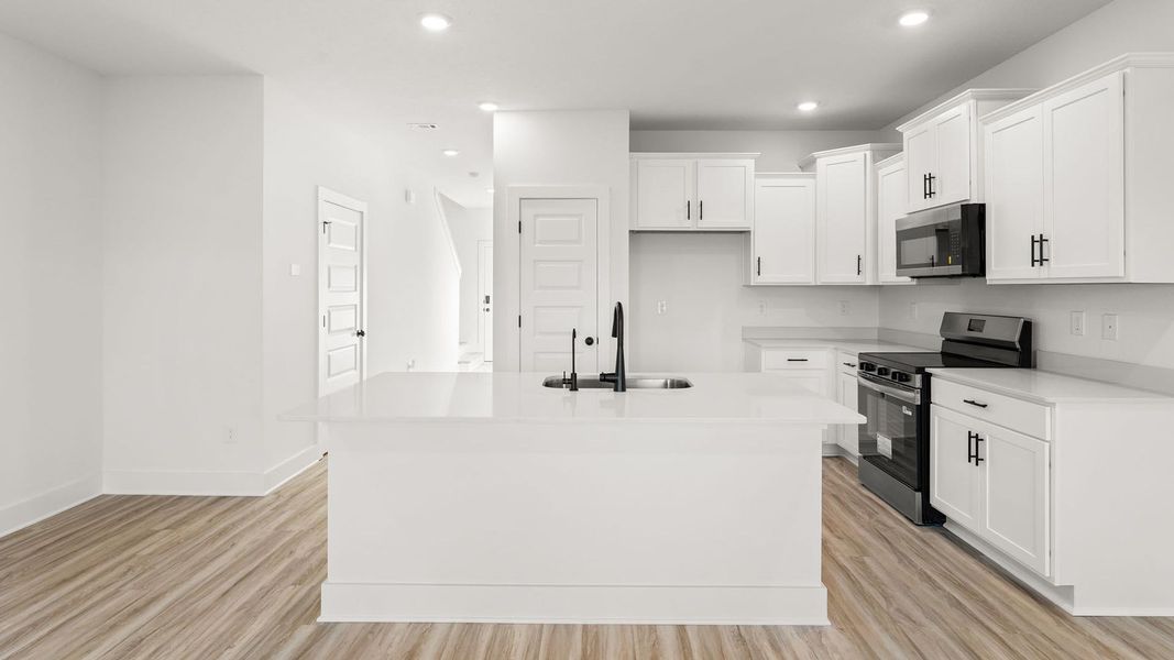 Furnished interior view inside a new home in Colonial East Townhomes, Panama City Beach (Image 8).
