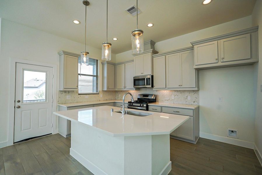Furnished interior view inside a new home in , Cypress (Image 6).