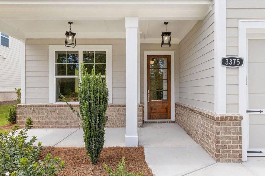 Front exterior of a new home in Hillshire, Cumming, GA, highlighting curb appeal (Image 19).