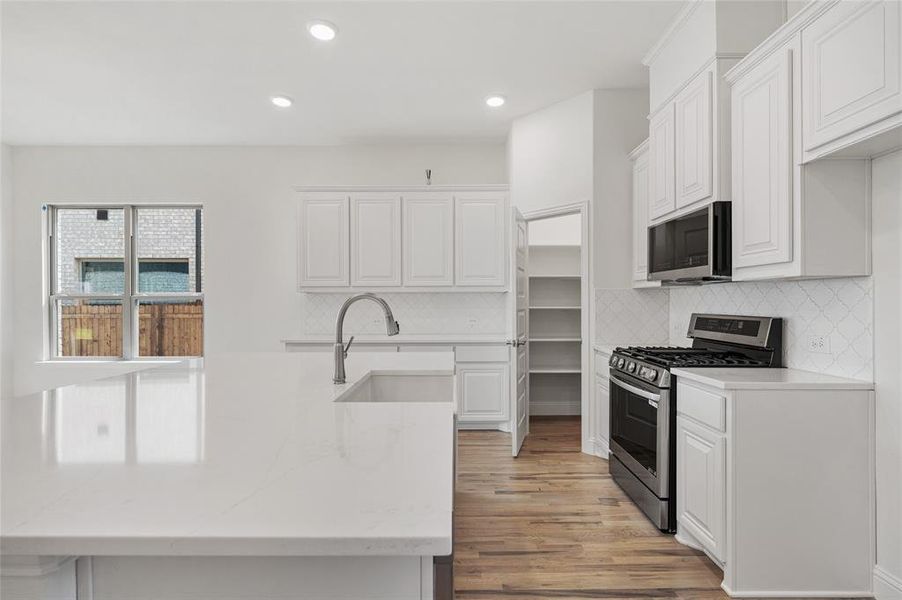 Furnished interior view inside a new home in Stone River Glen, Royse City (Image 11). Furnished interior view inside a new home in Stone River Glen, Royse City (Image 11).