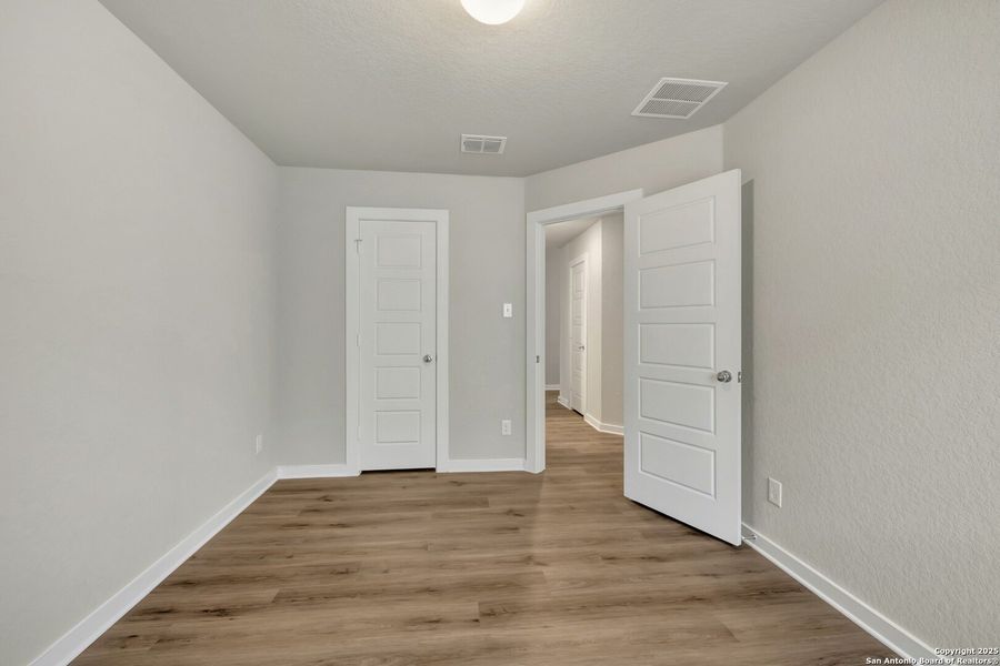 Spacious, unfurnished interior of a new home in Winding Brook, San Antonio (Image 31).