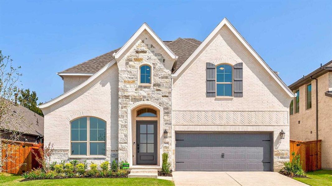 Front exterior of a new home in The Heights At Uptown Celina 50', Celina, TX, highlighting curb appeal (Image 2).