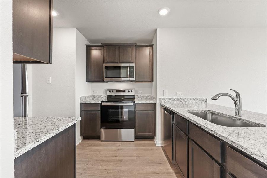Furnished interior view inside a new home in Retreat at Fossil Creek, Fort Worth (Image 2). Furnished interior view inside a new home in Retreat at Fossil Creek, Fort Worth (Image 2).