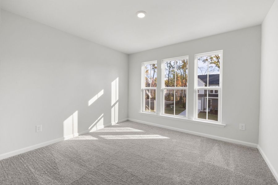 Spacious, unfurnished interior of a new home in Poets Walk, Whitsett (Image 18).