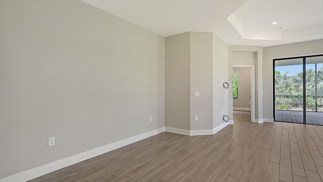 Spacious, unfurnished interior of a new home in Boca Royale Golf and Country Club at Wellen Park, Englewood (Image 27).