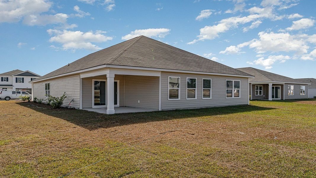 Exterior details and patio area of a home in Stanbury Creek, Supply (Image 3).