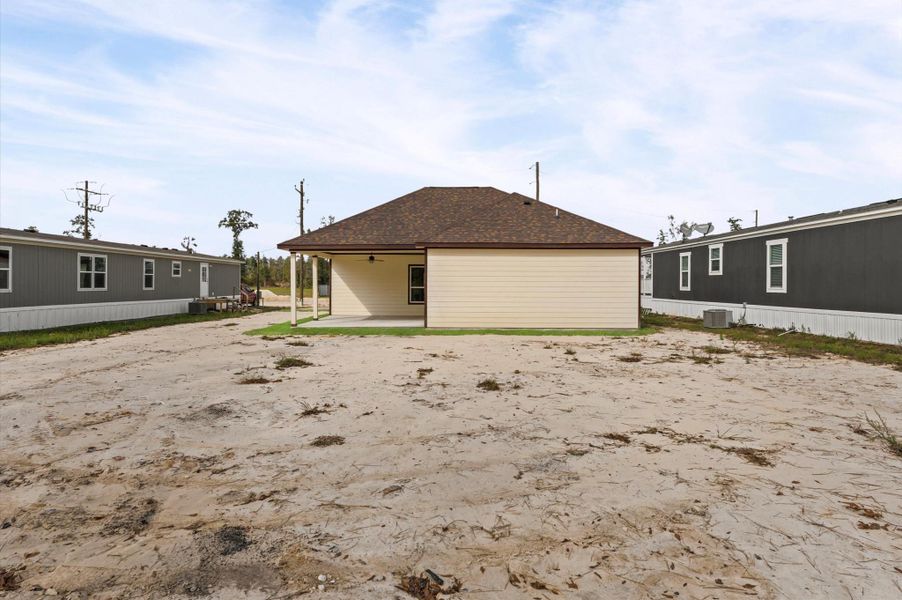 Exterior details and patio area of a home in , Huffman (Image 29).