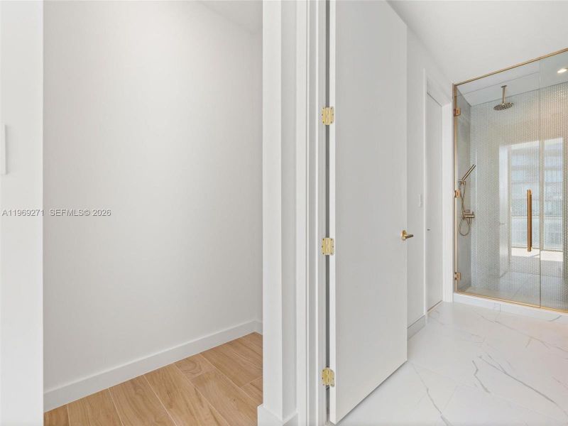 Spacious, unfurnished interior of a new home in Mr. C Residences, Miami (Image 21).