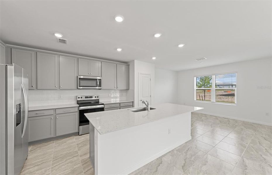 Furnished interior view inside a new home in Lakespur Wellen Park, Venice (Image 7).