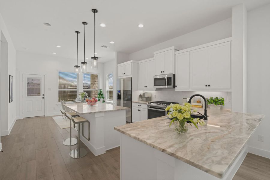 Representative furnished interior of a home built from the Greenville by Chesmar Homes in Wood Leaf Reserve, Tomball (Image 7).