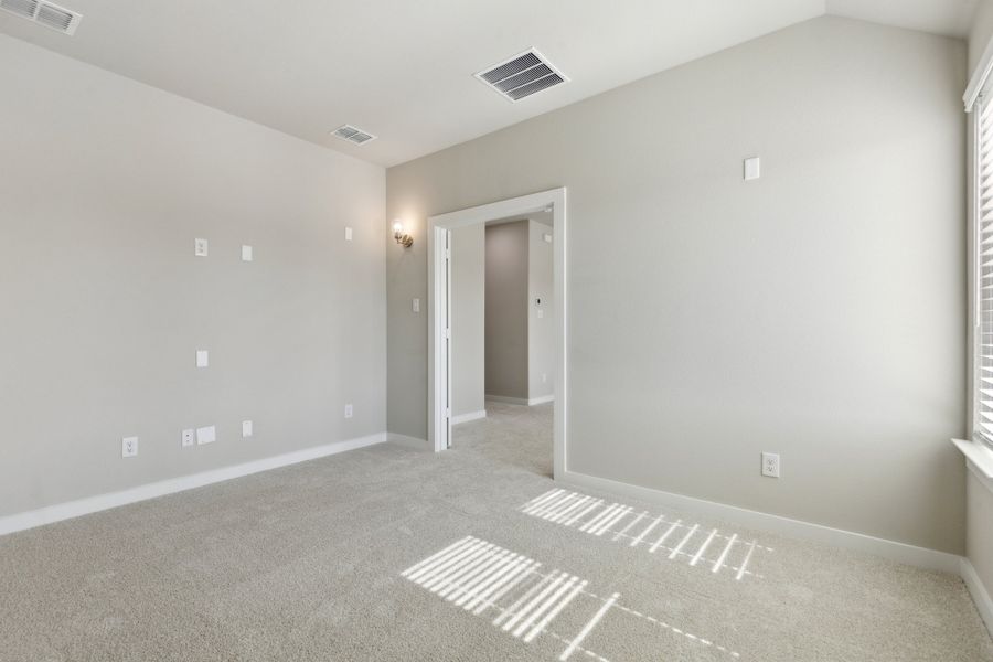 Media Room in the Claret home plan by Trophy Signature Homes – REPRESENTATIVE PHOTO