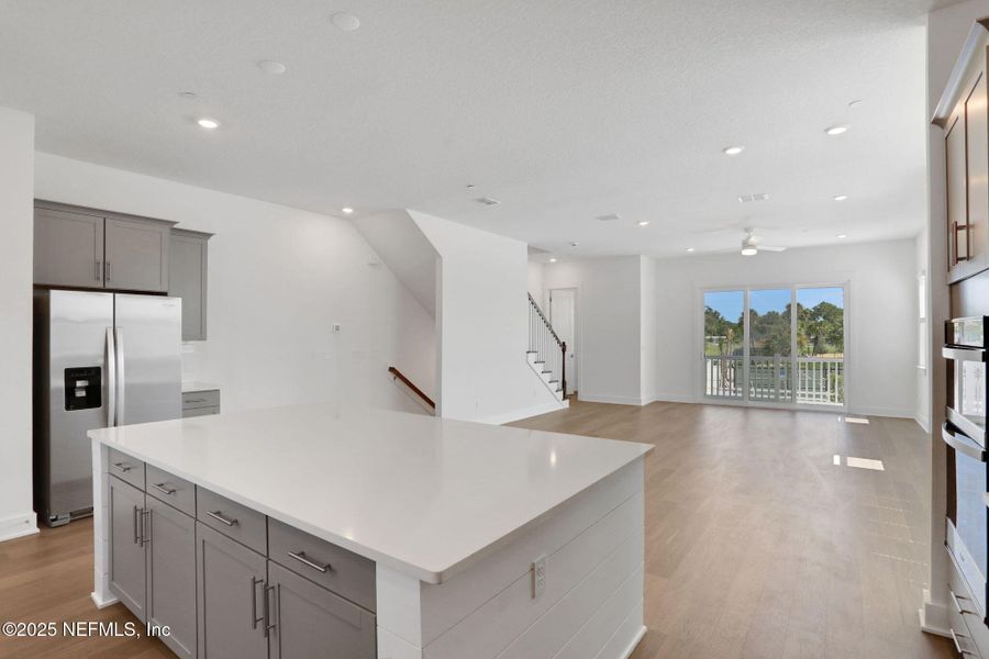 Furnished interior view inside a new home in North Beach Townhomes, Jacksonville Beach (Image 6).