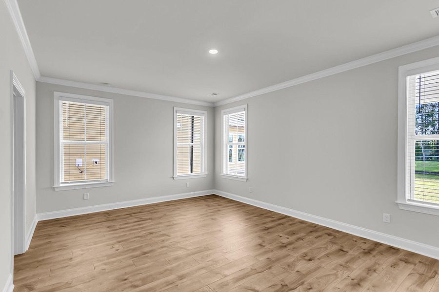 Spacious, unfurnished interior of a new home in Tidewater at Lakes of Cane Bay, Summerville (Image 24).