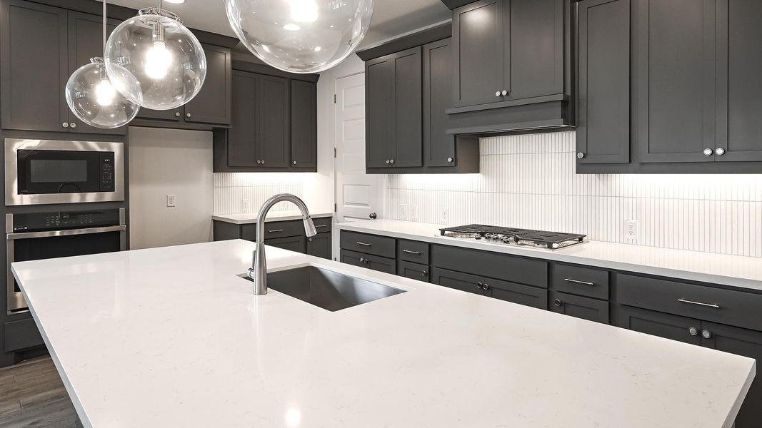 Furnished interior view inside a new home in 6 Creeks, Kyle (Image 6).