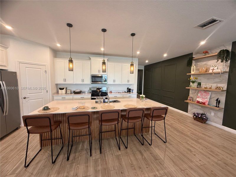 Furnished interior view inside a new home in Tradition, Port St. Lucie (Image 17).