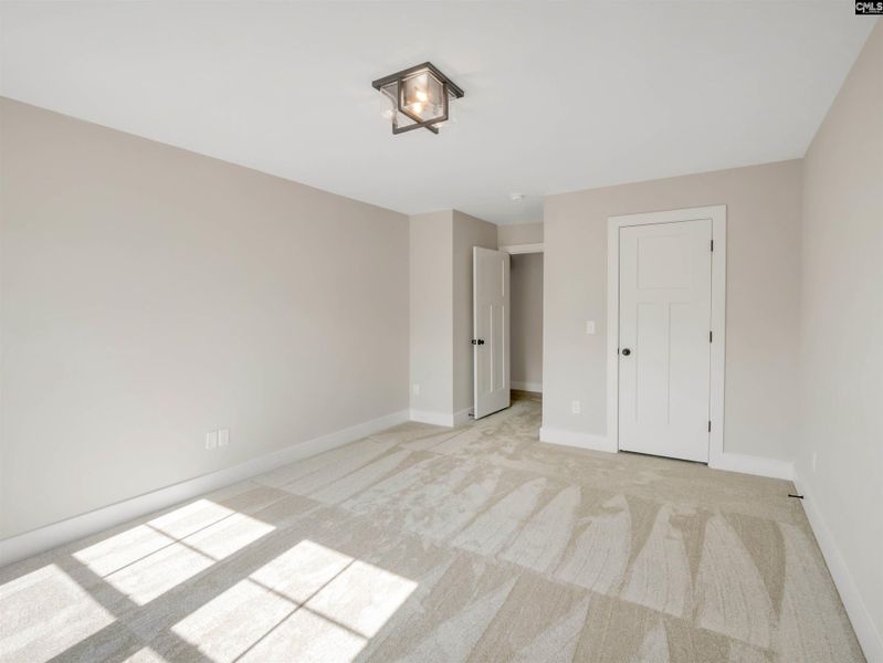 Spacious, unfurnished interior of a new home in Collins Cove, Chapin (Image 23).