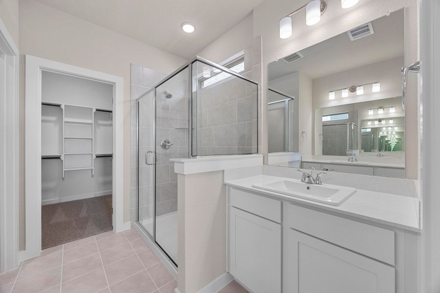 Primary Bathroom in the Magnolia home plan by Trophy Signature Homes – REPRESENTATIVE PHOTO Primary Bathroom in the Magnolia home plan by Trophy Signature Homes – REPRESENTATIVE PHOTO