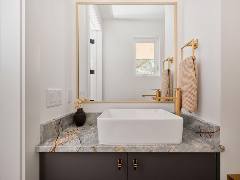 Bathroom featuring vanity Bathroom featuring vanity