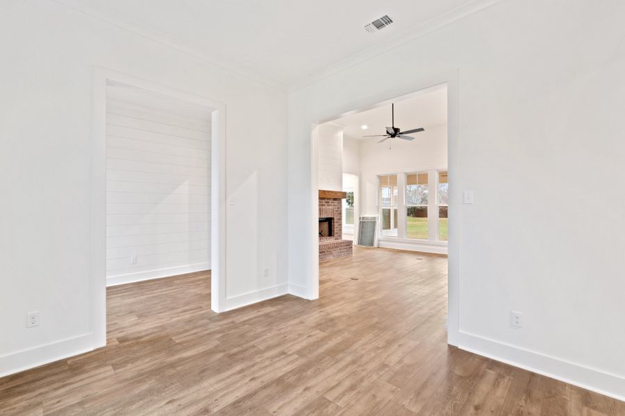 Representative unfurnished interior of a home built from the The Charlotte by Manuel Builders in Chapel Bend, Montgomery (Image 23).