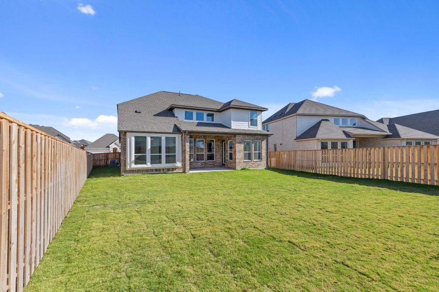 Rear of Home and Private Backyard