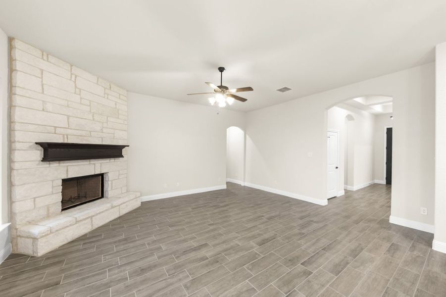 Family Room | Concept 2370 at Villages of Walnut Grove in Midlothian, TX by Landsea Homes