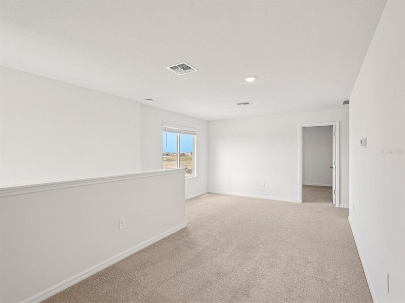 Spacious, unfurnished interior of a new home in Coasterra - Premier Series, Palmetto (Image 8).