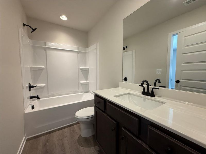 Furnished interior view inside a new home in The Towns at Auburn Station East, Auburn (Image 8).