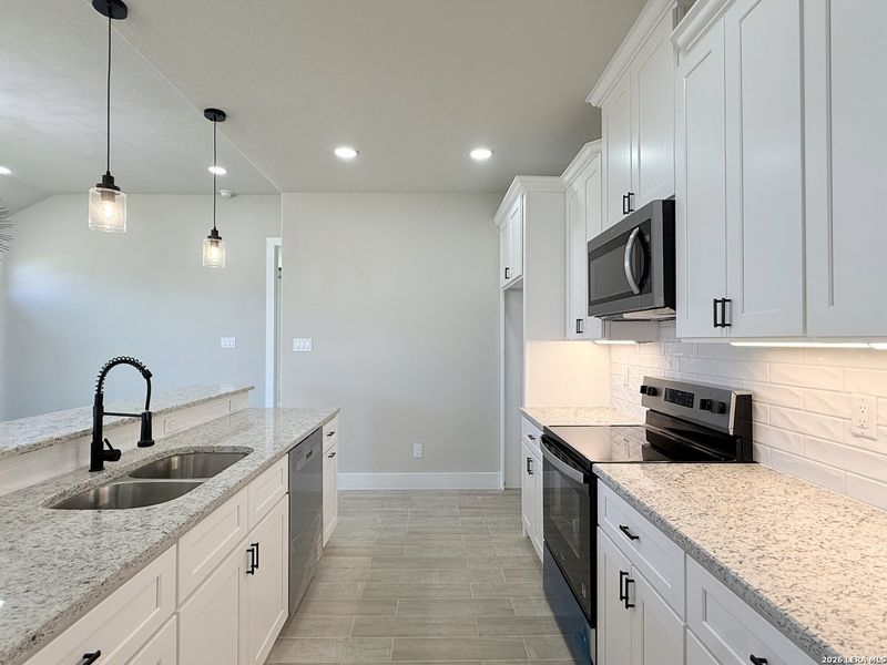 Furnished interior view inside a new home in , La Vernia (Image 3).