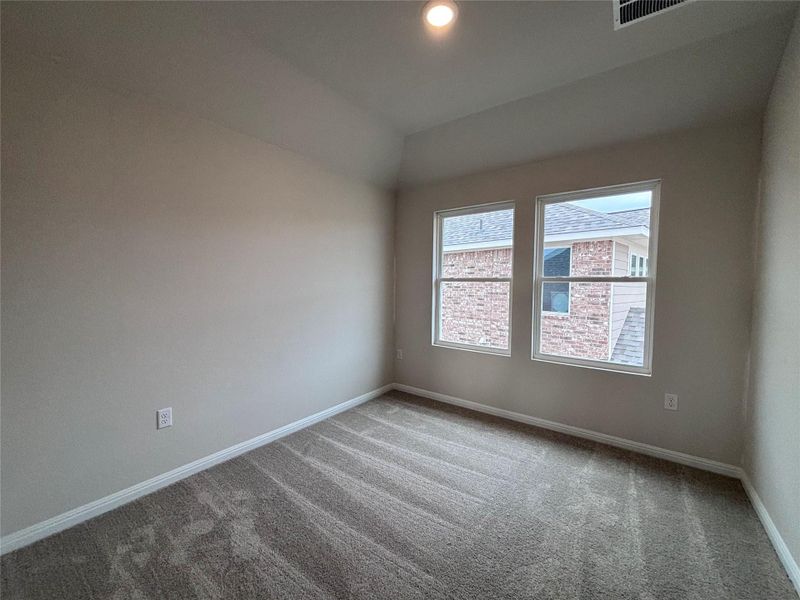 Spacious, unfurnished interior of a new home in The Colony 45s, Bastrop (Image 4).