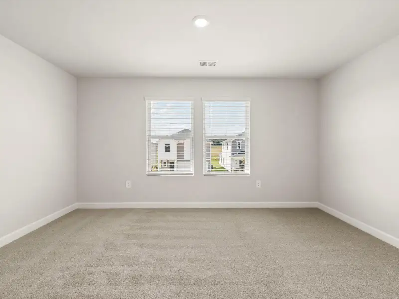 Spacious, unfurnished interior of a new home in Brayfield Manor - Heritage Collection, Wellford (Image 18).