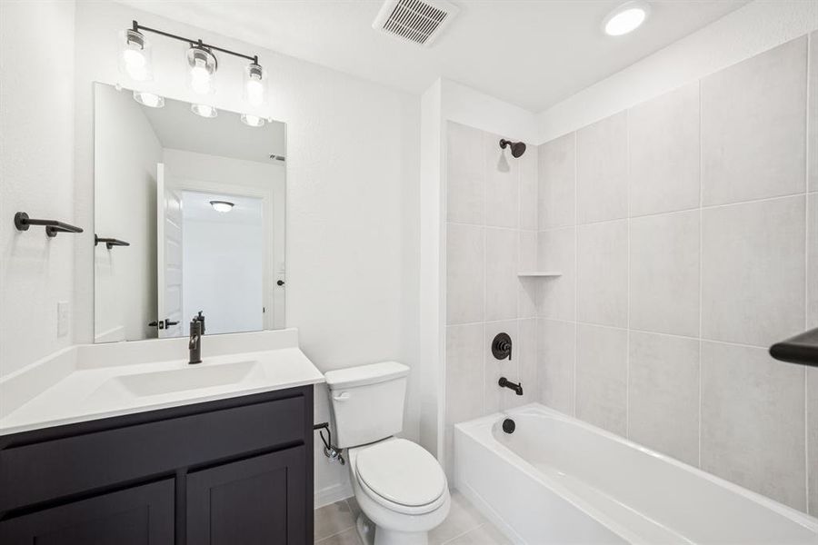 Furnished interior view inside a new home in Karis - Village Series, Crowley (Image 11). Furnished interior view inside a new home in Karis - Village Series, Crowley (Image 11).