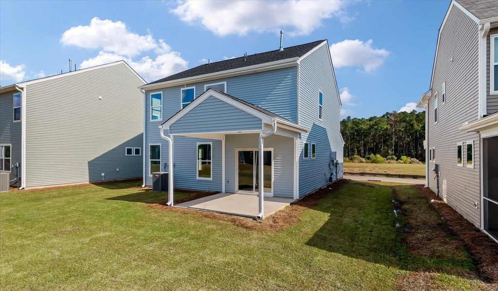 Exterior details and patio area of a home in Oakley Pointe, Moncks Corner (Image 22).