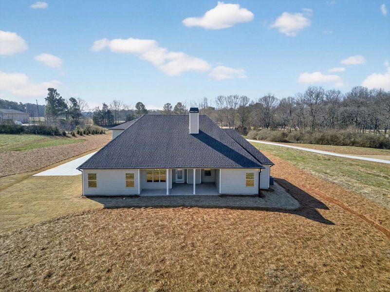 Exterior details and patio area of a home in Blackwelder Bluff, Bowdon (Image 4).