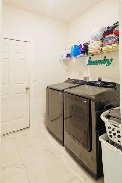 Furnished interior view inside a new home in , Port St. Lucie (Image 23).