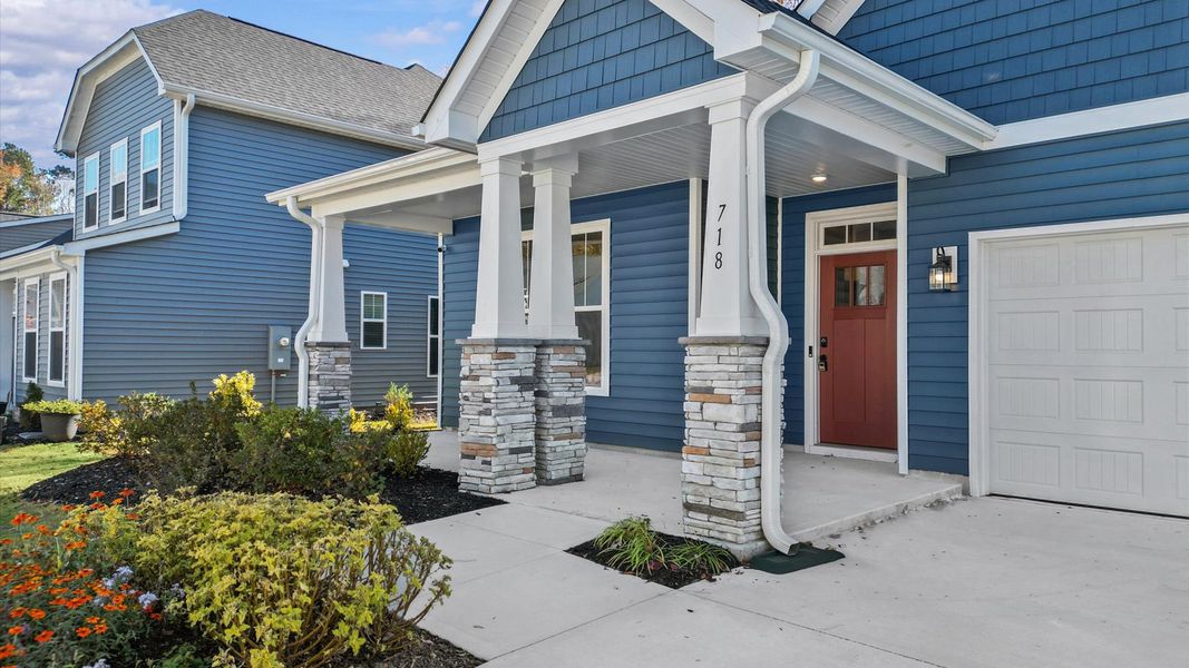 Elegant exterior with eye-catching curb appeal in a first-class DRB Homes community Elegant exterior with eye-catching curb appeal in a first-class DRB Homes community