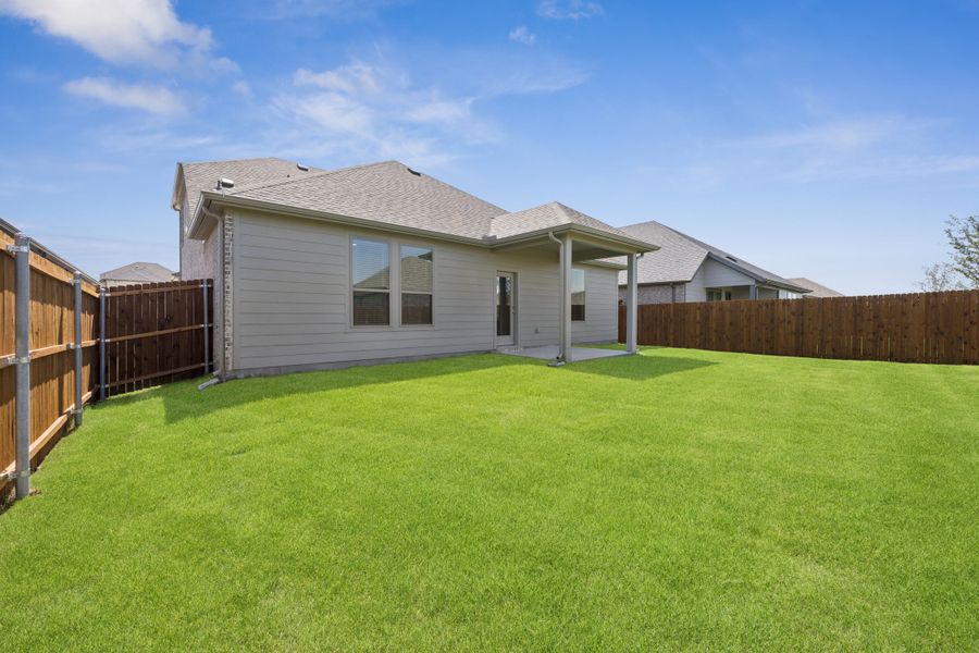Covered Patio in the Haylee home plan by Trophy Signature Homes - REPRESENTATIVE PHOTO Covered Patio in the Haylee home plan by Trophy Signature Homes - REPRESENTATIVE PHOTO