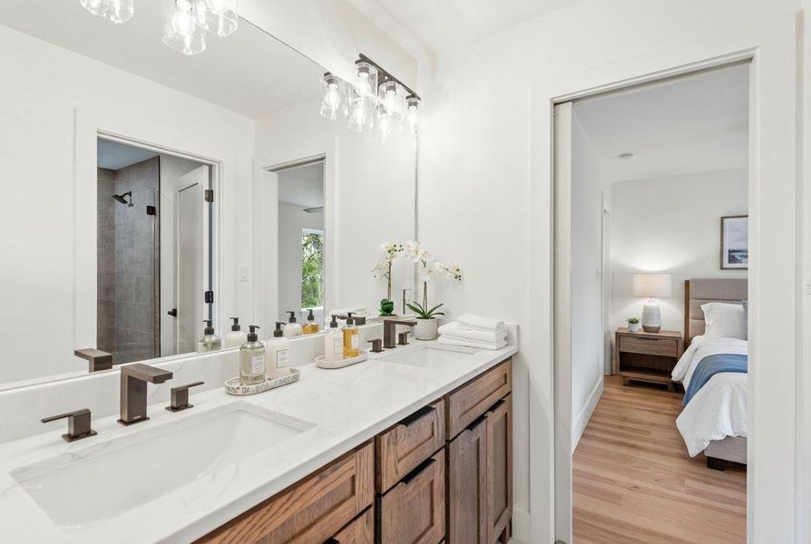 Two of the three upstairs bedrooms are linked by a Jack and Jill bathroom.