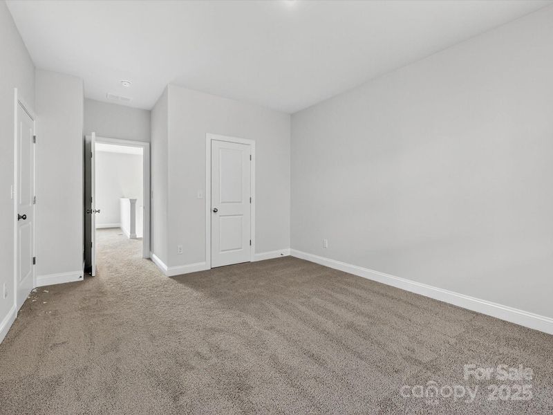 Spacious, unfurnished interior of a new home in North Creek Village, Huntersville (Image 37).