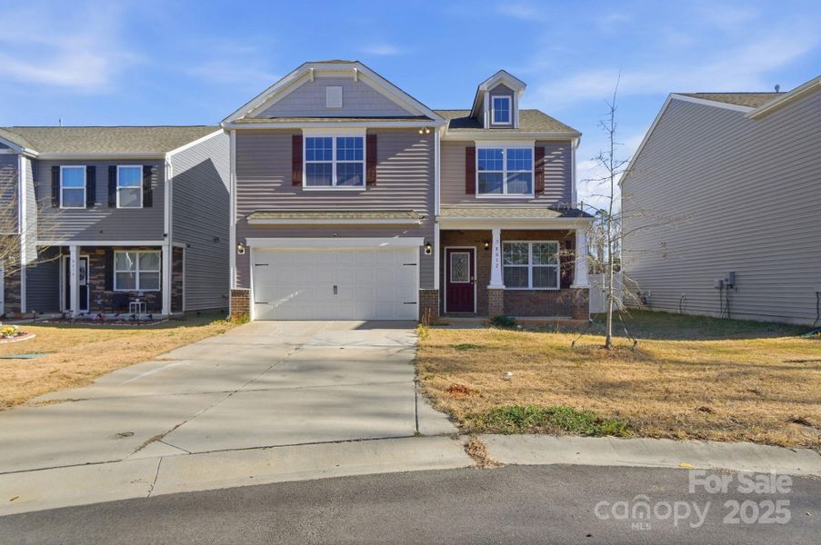 Front exterior of a new home in , Charlotte, NC, highlighting curb appeal (Image 1). Front exterior of a new home in , Charlotte, NC, highlighting curb appeal (Image 1).