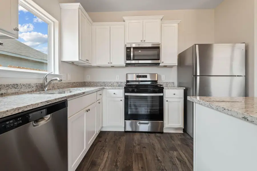 Furnished interior view inside a new home in Trails at Cochran Ranch, Waller (Image 5).