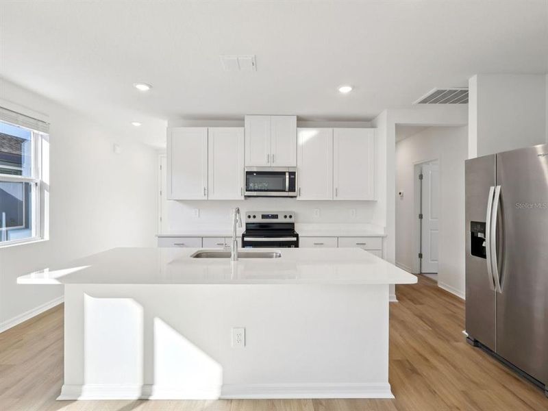 Furnished interior view inside a new home in Oakfield Trails - Premier Series, Parrish (Image 5).