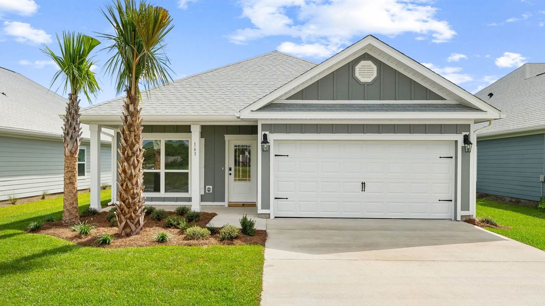 Front exterior of a new home in Caballeros Estates At Hombre, Panama City Beach, FL, highlighting curb appeal (Image 1). Front exterior of a new home in Caballeros Estates At Hombre, Panama City Beach, FL, highlighting curb appeal (Image 1).