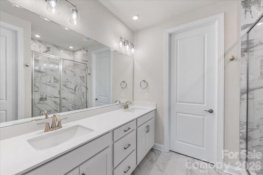 Primary Bathroom with Walk-In Closet
