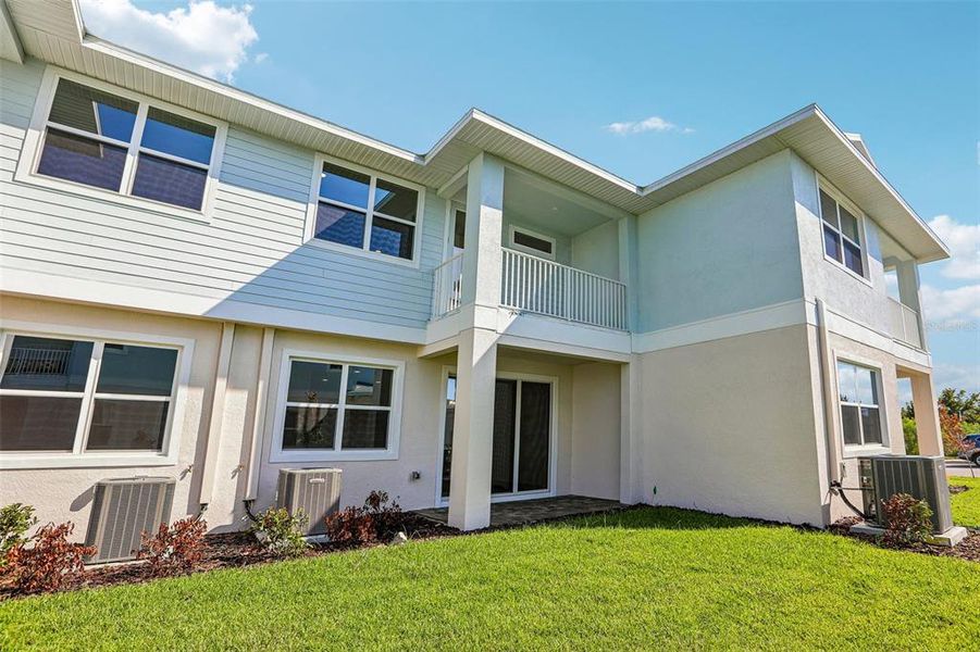 Exterior details and patio area of a home in Lagoon Residences at Epperson, Wesley Chapel (Image 27).