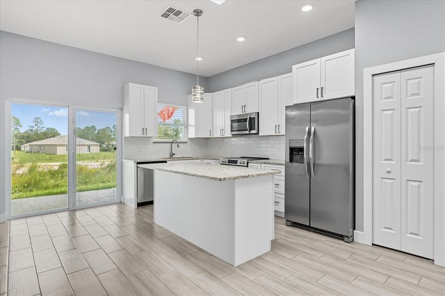 Furnished interior view inside a new home in , Kissimmee (Image 8).