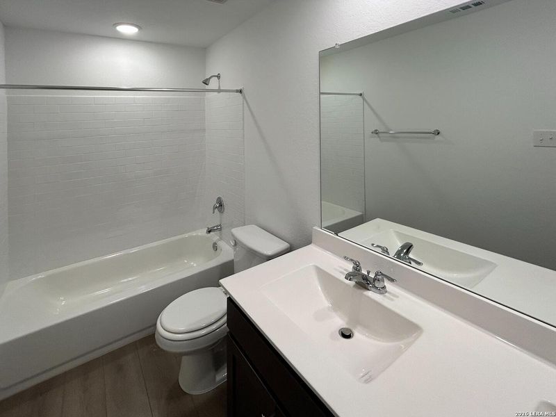 Furnished interior view inside a new home in Hennersby Hollow, San Antonio (Image 11).