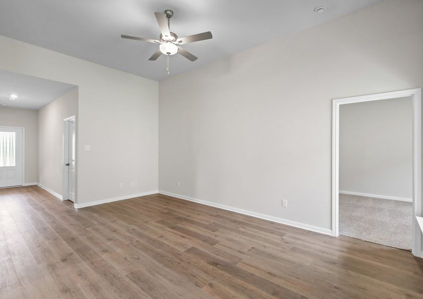 The family room is large and has plenty of space for furniture. The family room is large and has plenty of space for furniture.